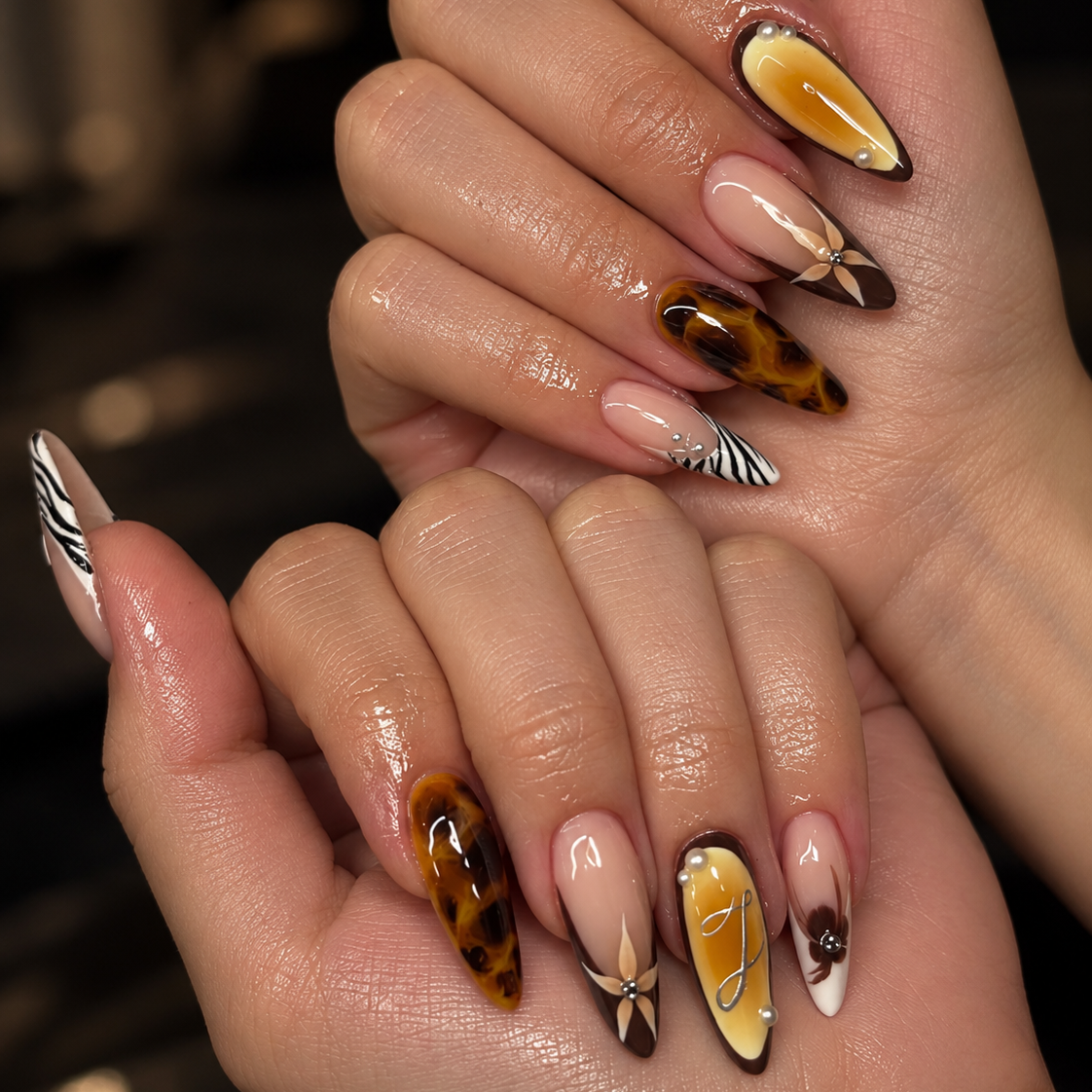 Trendy Western-style, Instagram-inspired long, almond-shaped nails with rounded tips